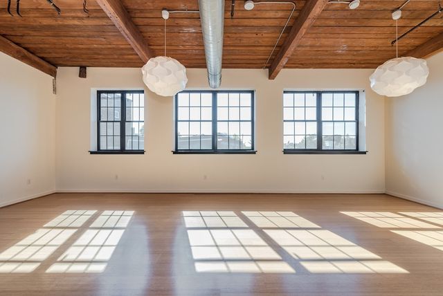 an empty room with windows