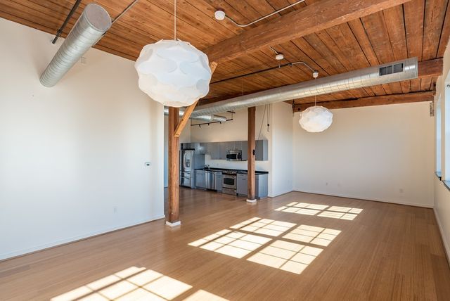a view of a livingroom with a patio and a fireplace