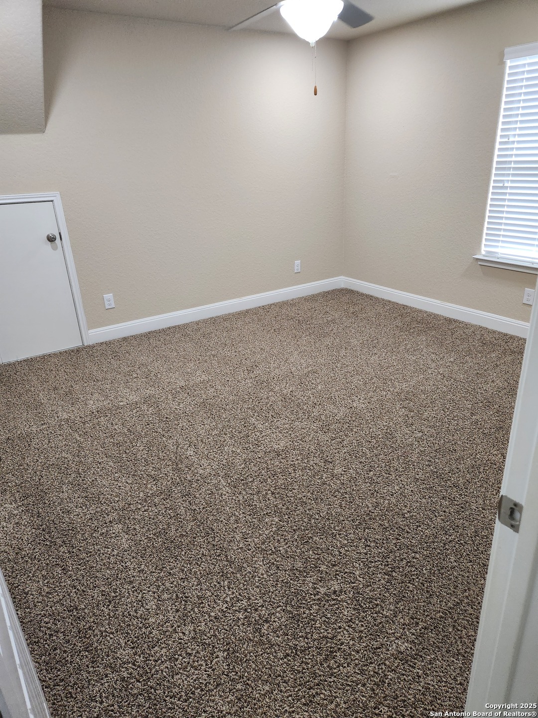 1806 Ayleth Avenue San Antonio, TX 78213 - Photo 12 of 16 an empty room with windows