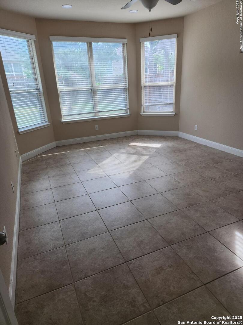 1806 Ayleth Avenue San Antonio, TX 78213 - Photo 5 of 16 a view of an empty room with a window