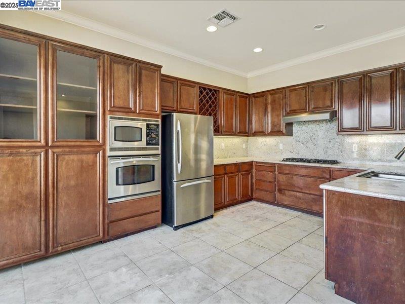 Rio Vista Rio Vista, CA 94571 - Photo 11 of 30 a kitchen with stainless steel appliances granite countertop a refrigerator and a stove top oven