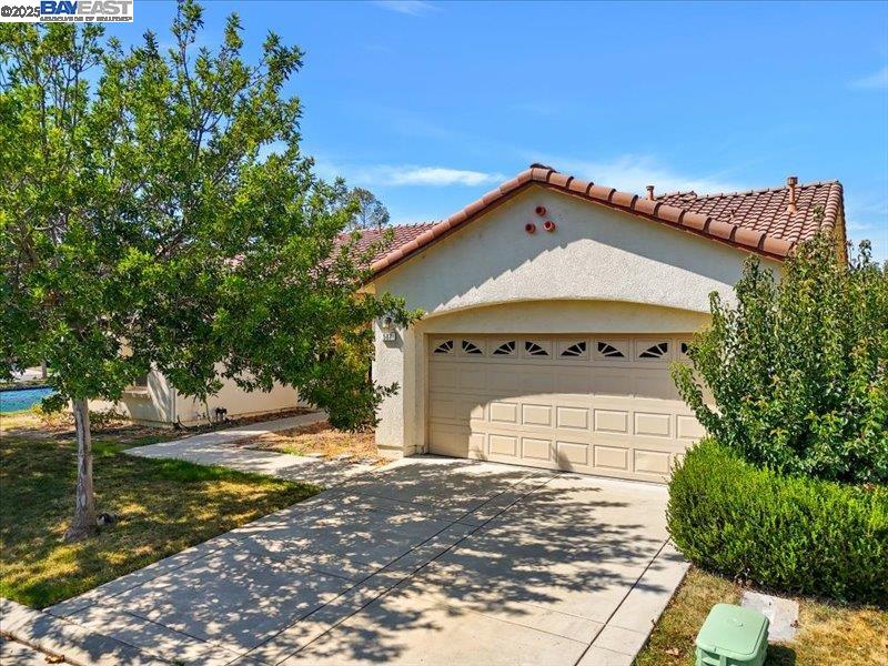 Rio Vista Rio Vista, CA 94571 - Photo 24 of 30 a front view of a house with a yard
