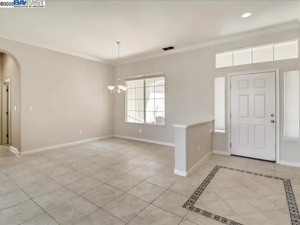 a view of livingroom with furniture and windows