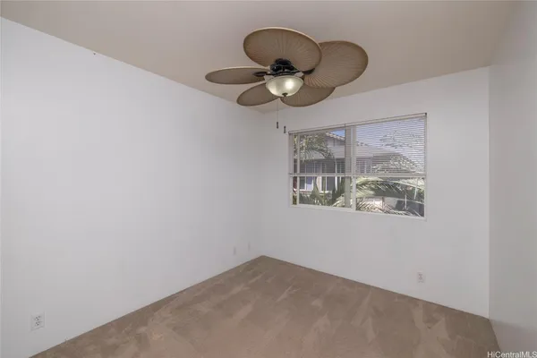 a view of room window and wooden floor