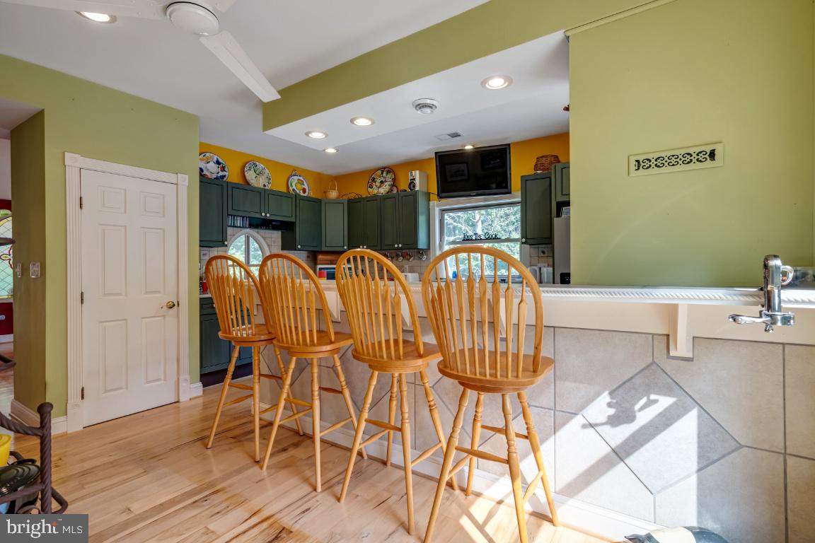 1528 Stringtown Road Berryville, VA 22611 - Photo 35 of 85 Tiled Breakfast Bar / Island & Eat-In Dining Area
