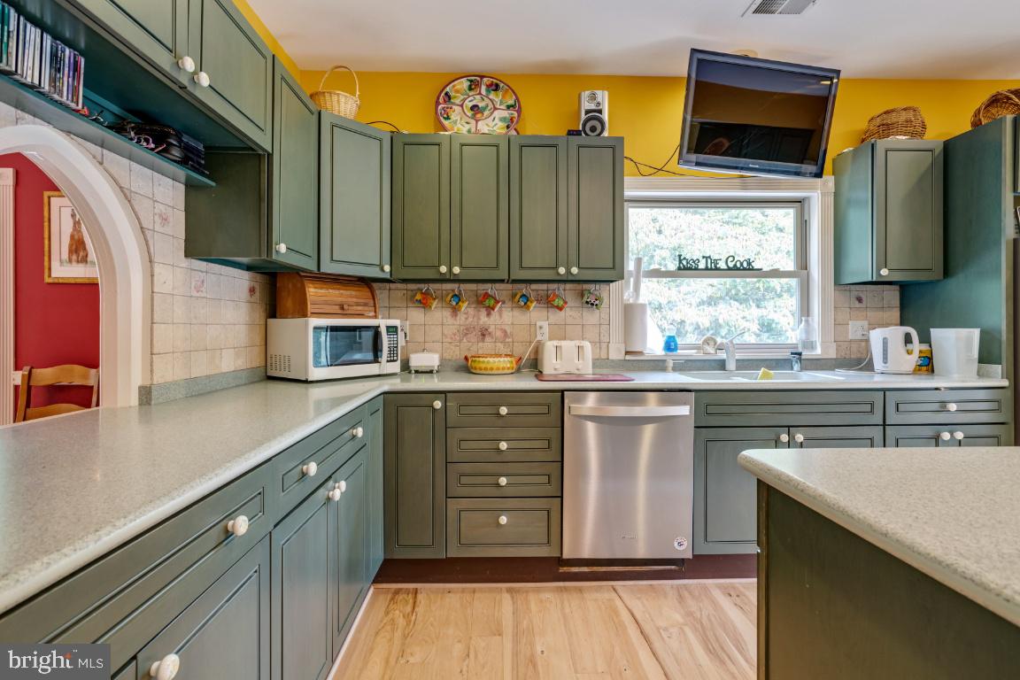 1528 Stringtown Road Berryville, VA 22611 - Photo 36 of 85 Gorgeous Custom Cabinetry & Corian Counters