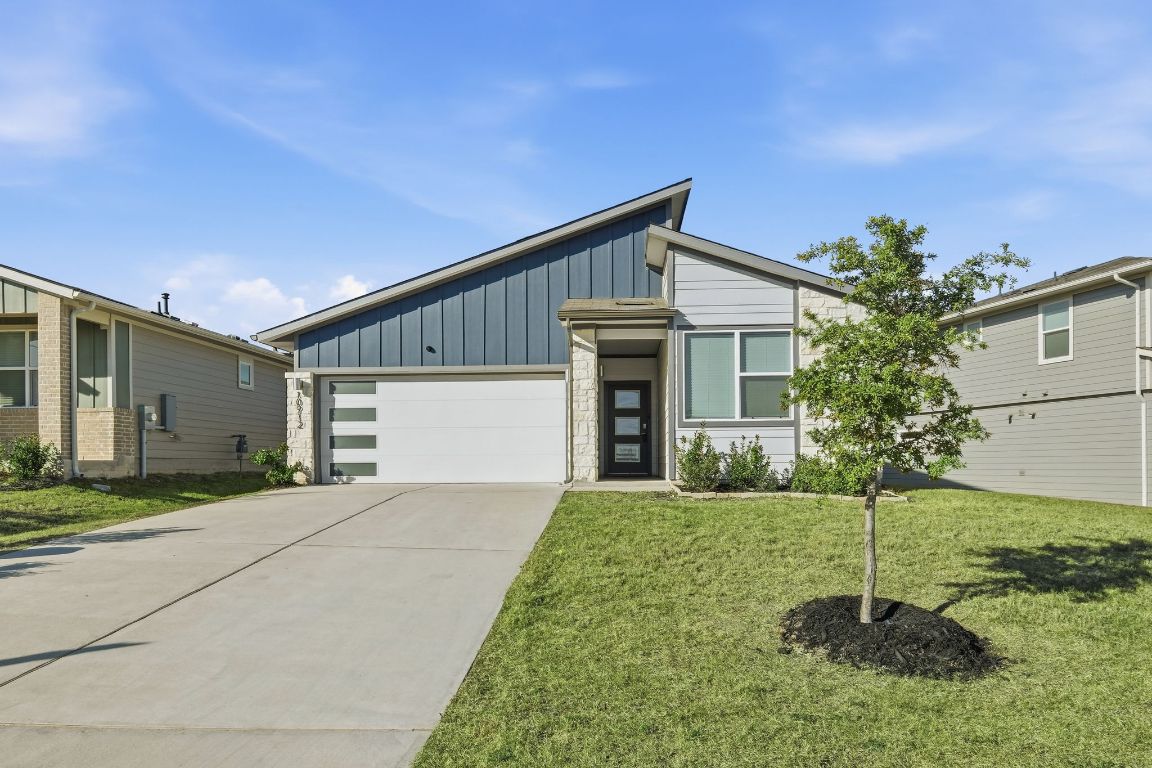 a house view with a garden space