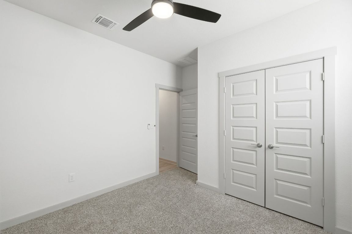 10912 Fulton Avenue Austin, TX 78754 - Photo 11 of 15 an empty room with closet area