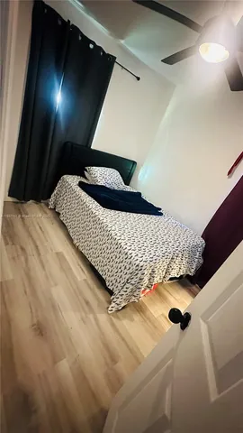 a bathroom with a toilet a sink and a shower