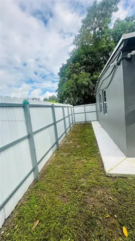 a living room with a rug