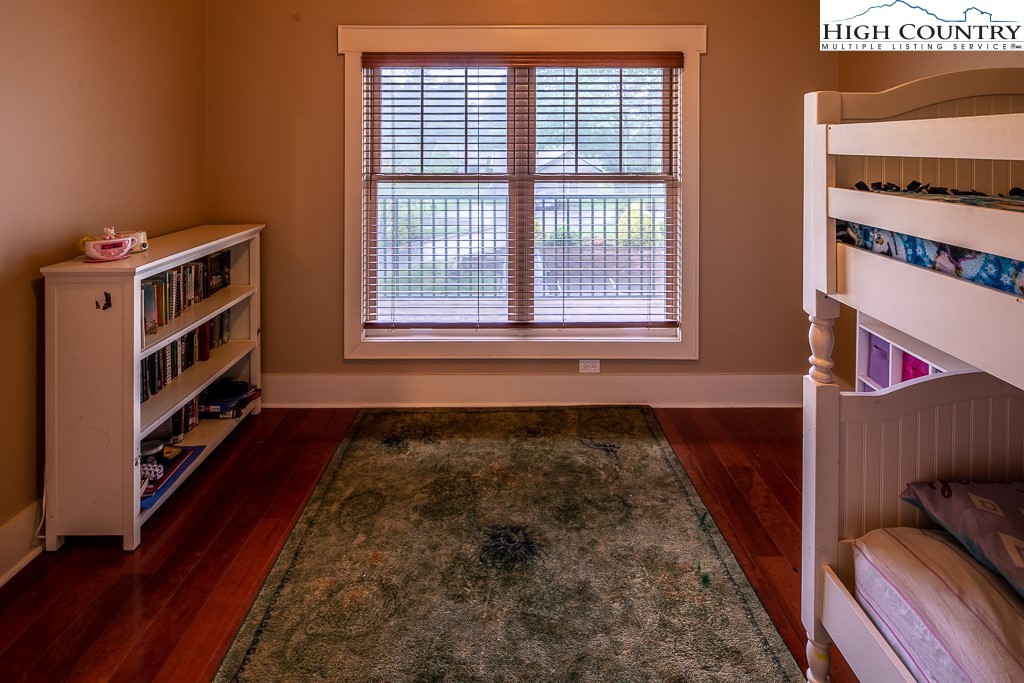 148 Highway 105 Extension, Unit 203 Boone, NC 28607 - Photo 19 of 25 a view of an empty room with a window
