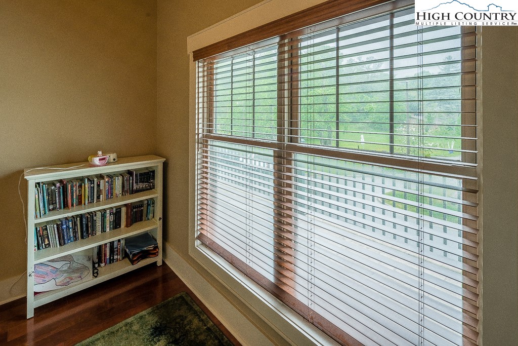 148 Highway 105 Extension, Unit 203 Boone, NC 28607 - Photo 20 of 25 a view of a balcony with a large window