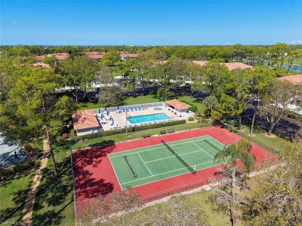5965 Bloomfield Circle, Unit B104 Naples, FL 34112 - Photo 19 of 39 a view of outdoor space patio and mountain view