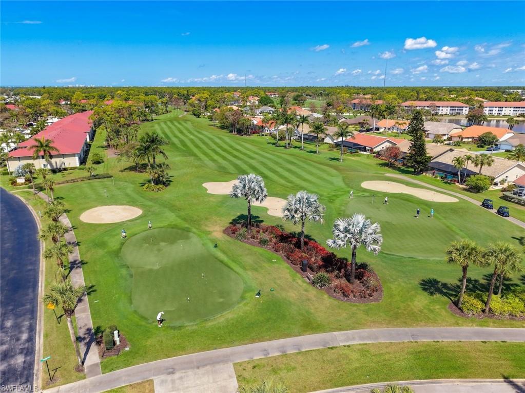 5965 Bloomfield Circle, Unit B104 Naples, FL 34112 - Photo 21 of 39 a view of a city