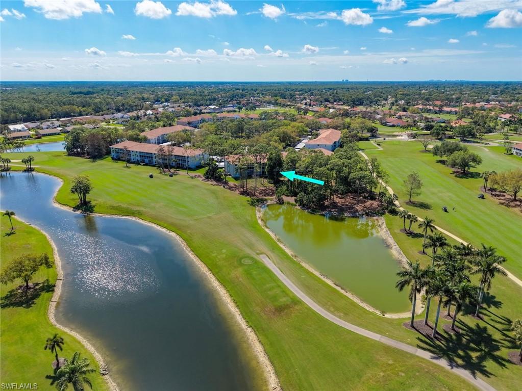 5965 Bloomfield Circle, Unit B104 Naples, FL 34112 - Photo 25 of 39 a view of a city