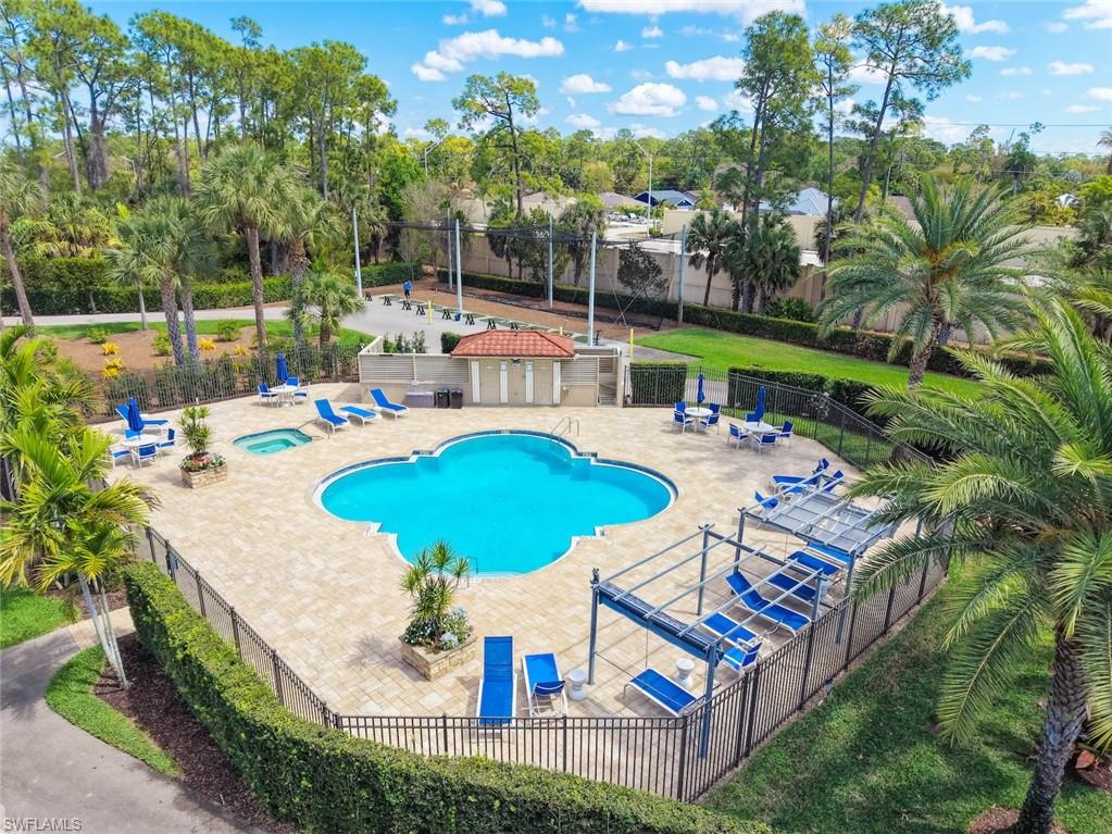5965 Bloomfield Circle, Unit B104 Naples, FL 34112 - Photo 32 of 39 an outdoor space with furniture