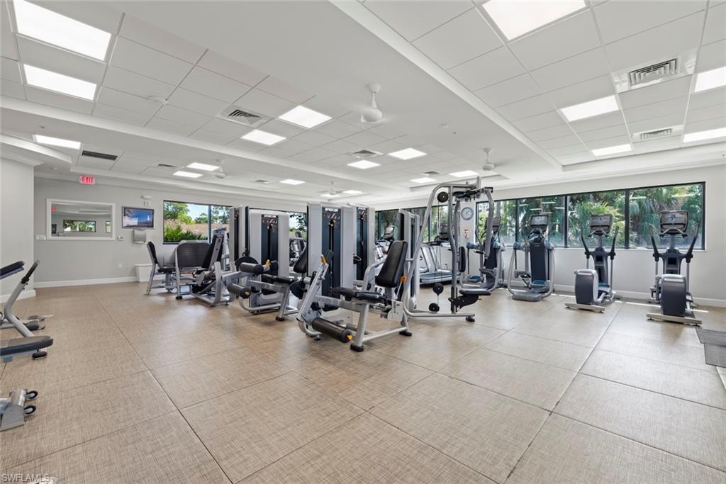5965 Bloomfield Circle, Unit B104 Naples, FL 34112 - Photo 33 of 39 a view of a room with gym equipment