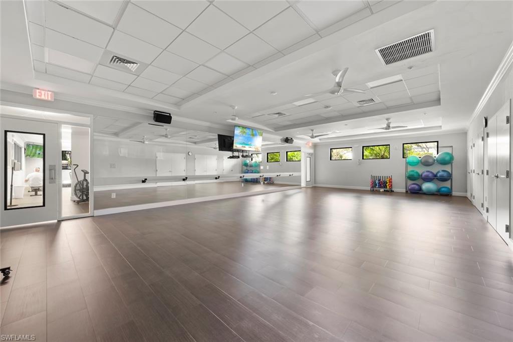 5965 Bloomfield Circle, Unit B104 Naples, FL 34112 - Photo 35 of 39 a view of a room with gym equipment