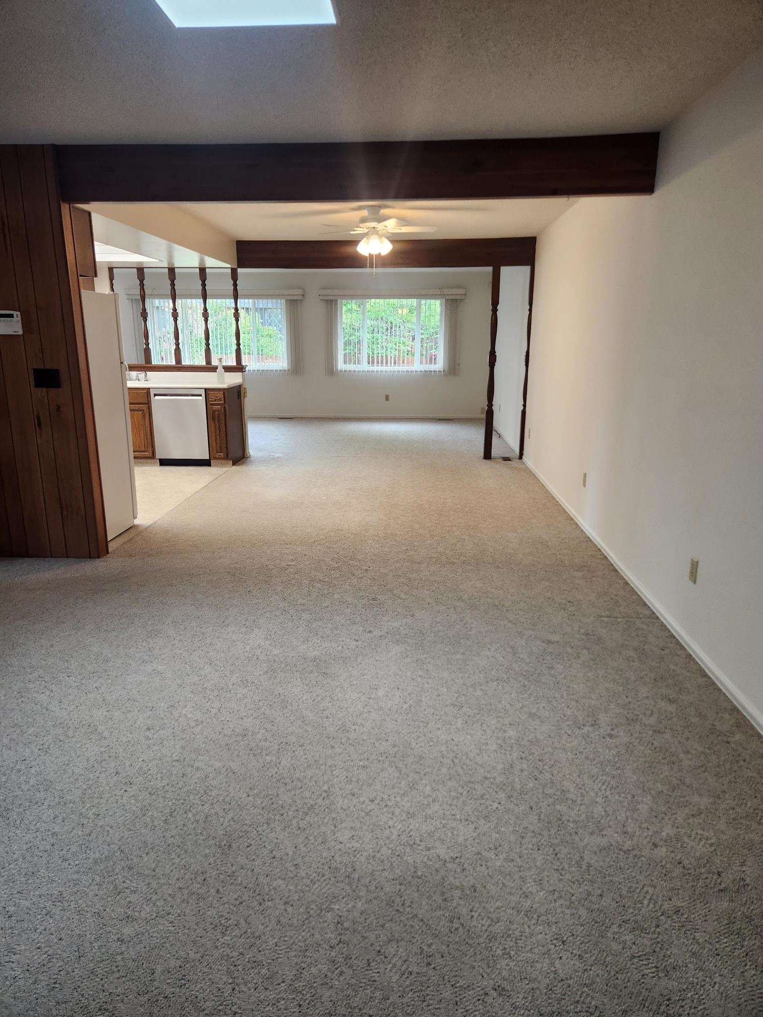 2700 G Road, Unit 7B Grand Junction, CO 81506 - Photo 12 of 31 a view of an empty room with a fireplace