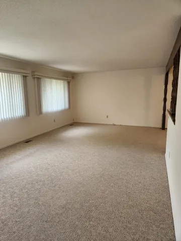 a view of a livingroom with a staircase