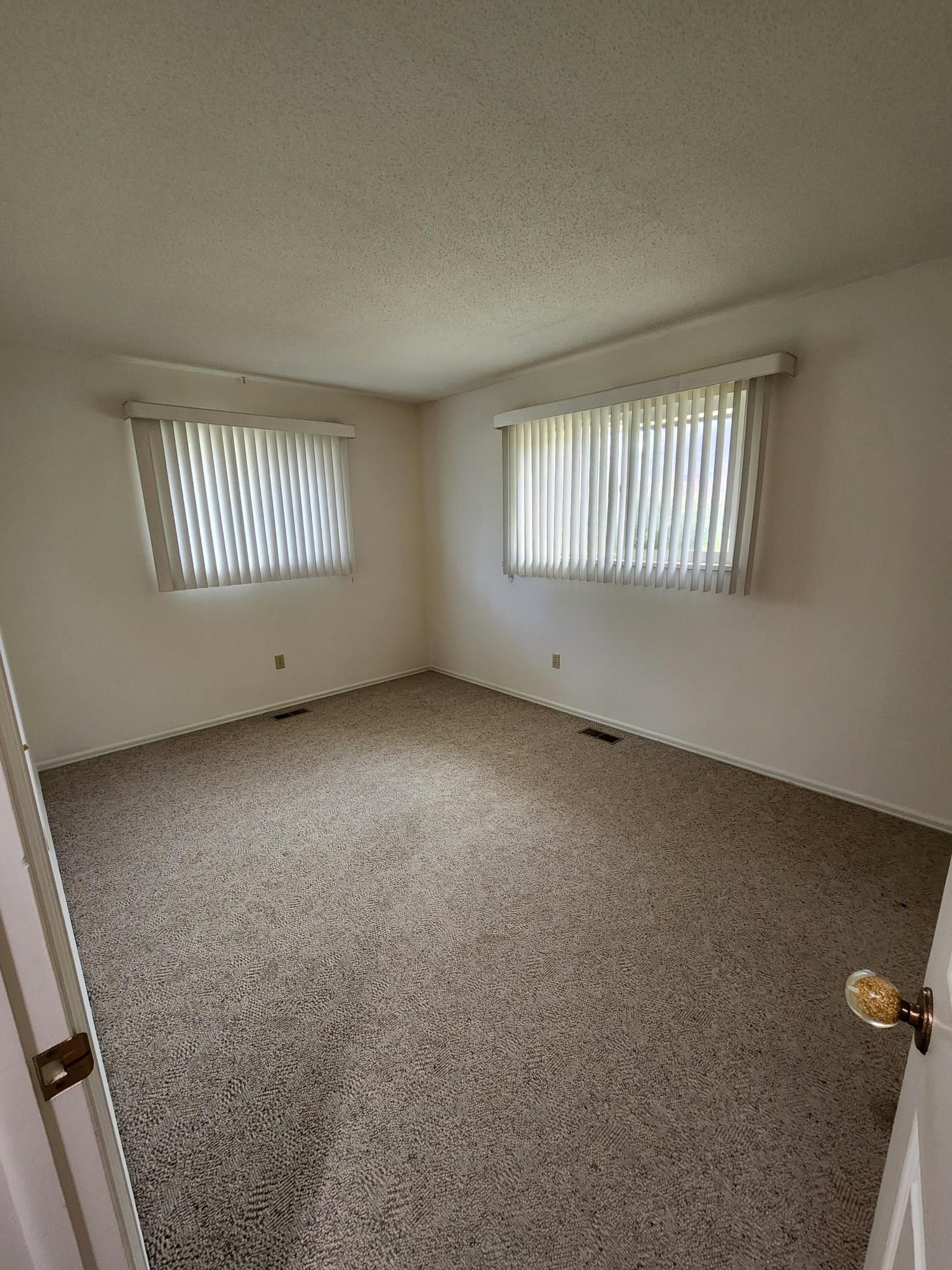 2700 G Road, Unit 7B Grand Junction, CO 81506 - Photo 19 of 31 an empty room with windows