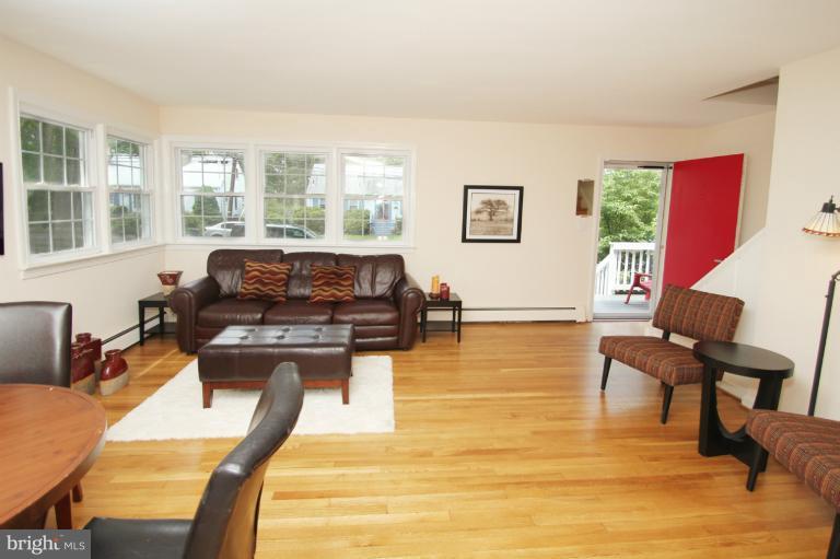 10209 Procter Street Silver Spring, MD 20901 - Photo 14 of 23 a living room with furniture and a table