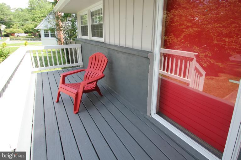 10209 Procter Street Silver Spring, MD 20901 - Photo 4 of 23 a view of a two chairs in the balcony