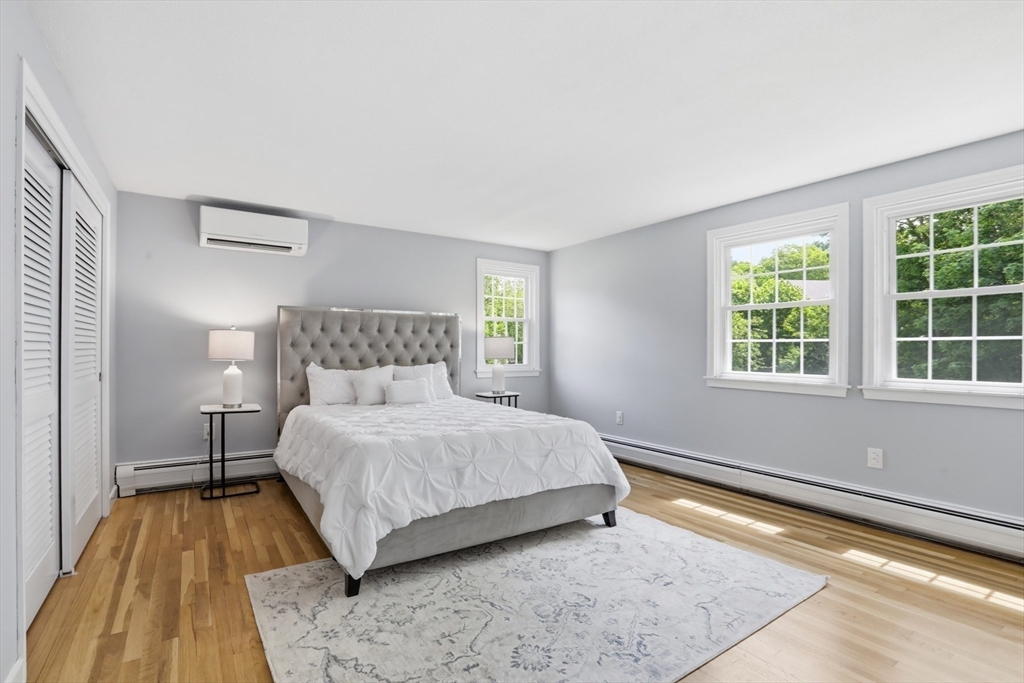 94 Johnson Road Winchester, MA 01890 - Photo 17 of 40 a bedroom with a bed and a window