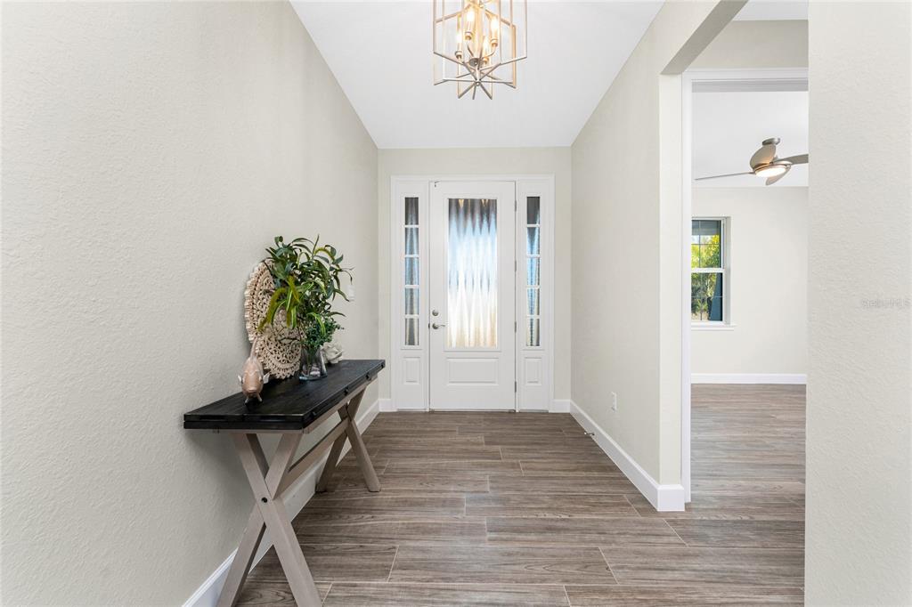 399 Sunset Road Rotonda West, FL 33947 - Photo 9 of 57 a view of entryway with livingroom