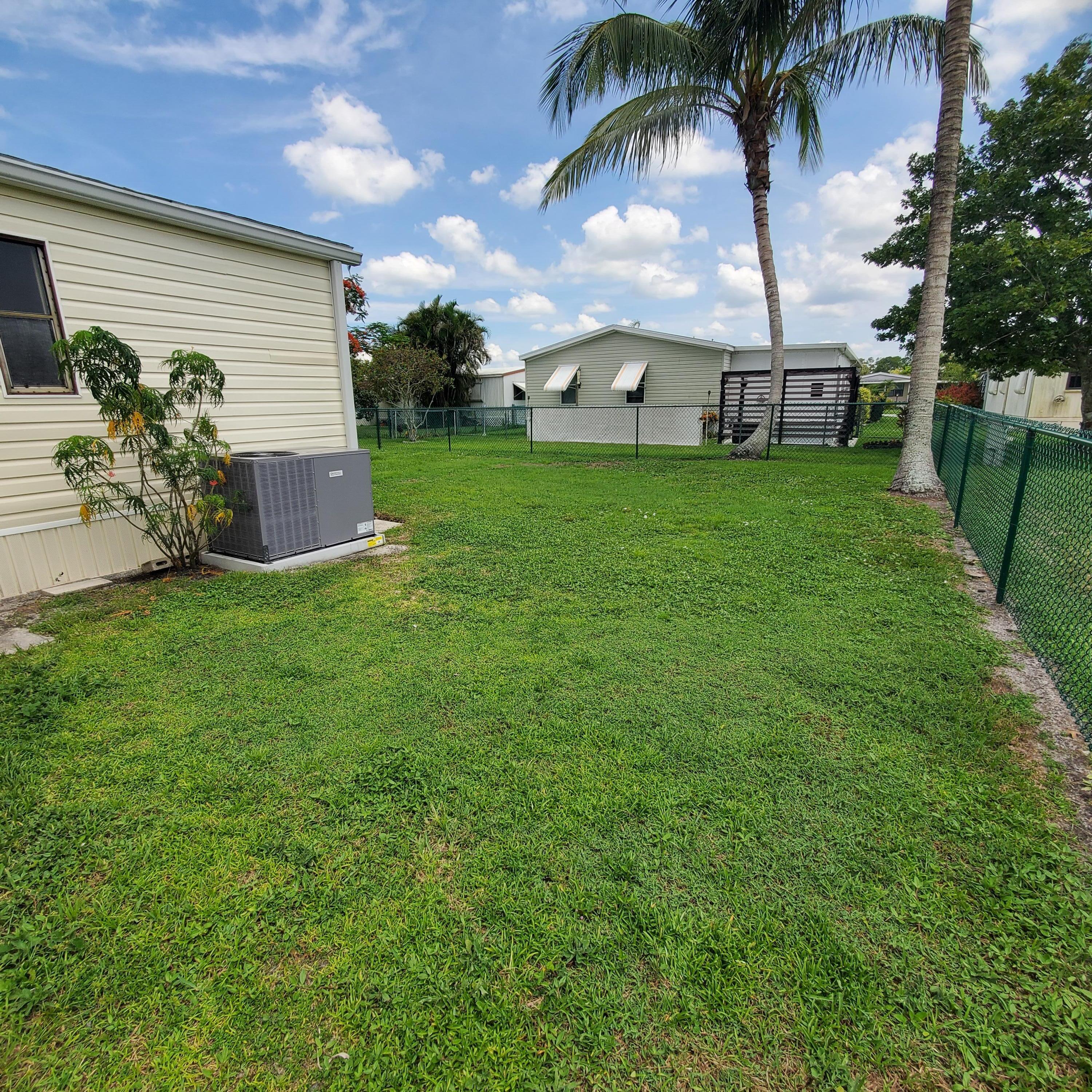 2706 Southwest Pontiac Place Stuart, FL 34997 - Photo 3 of 15 Fenced Yard