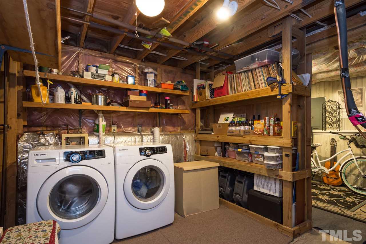 7140 Shellburne Drive Raleigh, NC 27612 - Photo 18 of 22 a utility room with dryer and washer