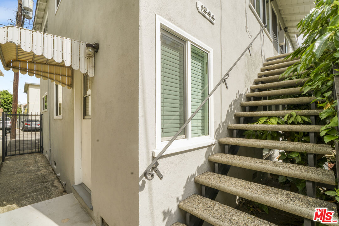 1246 South Saltair Avenue Los Angeles, CA 90025 - Photo 7 of 27 a view of entryway and hall with wooden floor