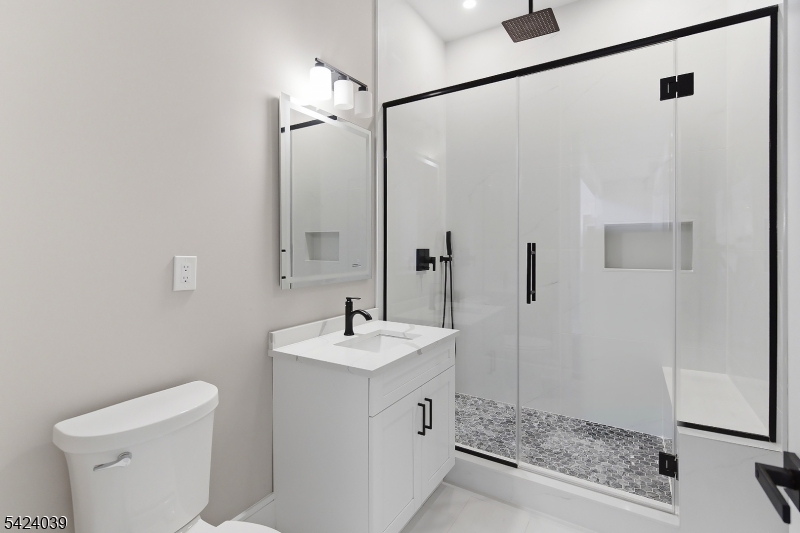 45 Kildee Road Belle Mead, NJ 08502 - Photo 22 of 43 a bathroom with a sink a toilet and shower