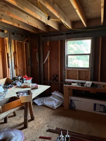 a room with furniture and a window