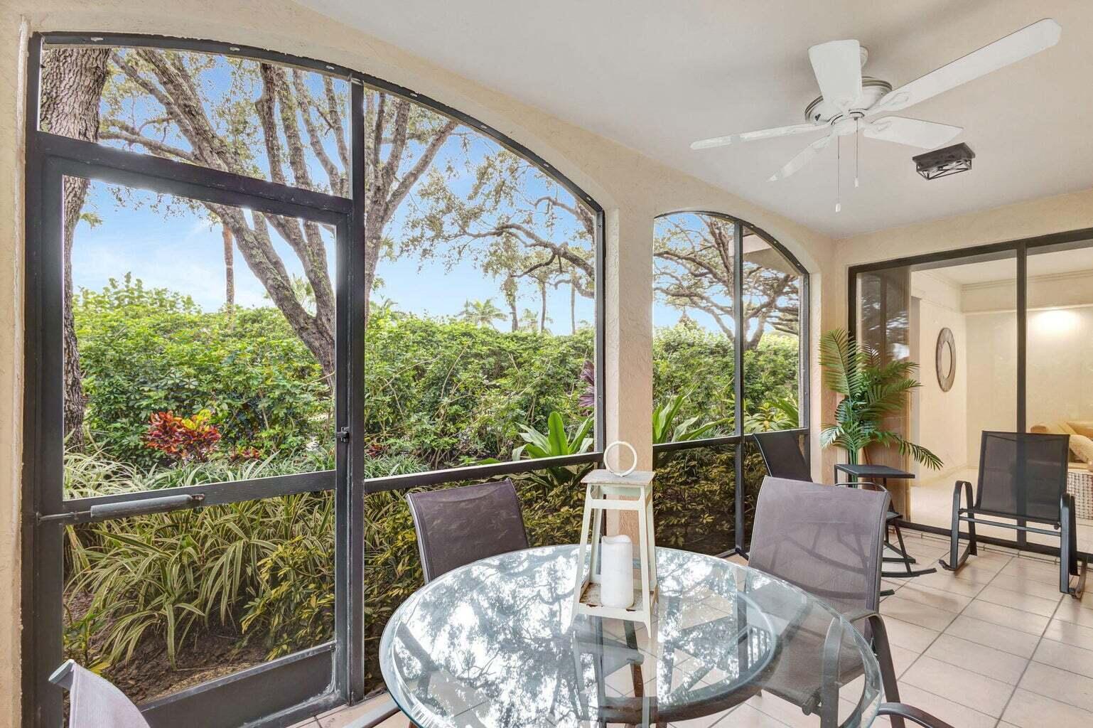 16151 West Bay Drive, Unit 161 Jupiter, FL 33477 - Photo 24 of 25 a view of a dining room with furniture window and outside view