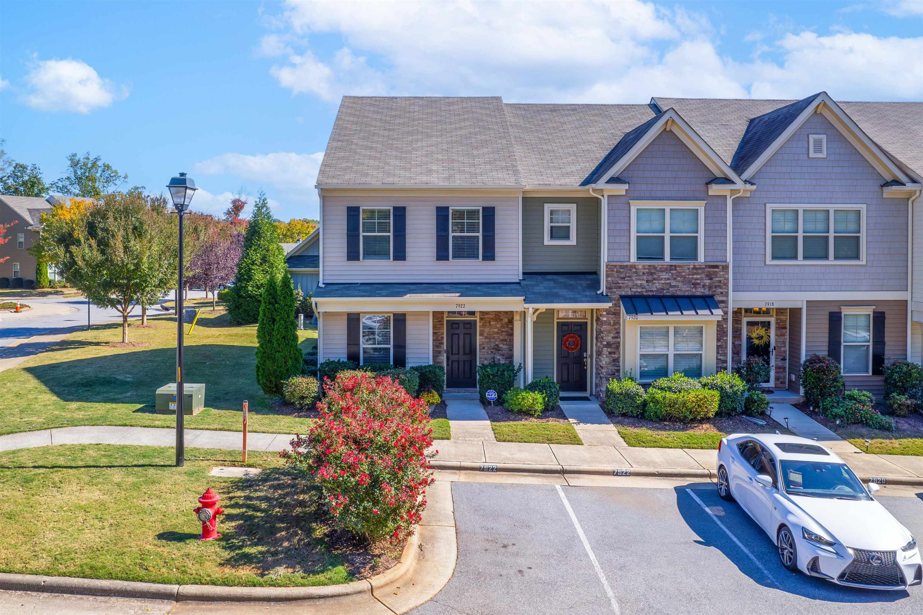 7922 Allscott Way Raleigh, NC 27612 - Photo 2 of 28 a view of a house with swimming pool and a yard