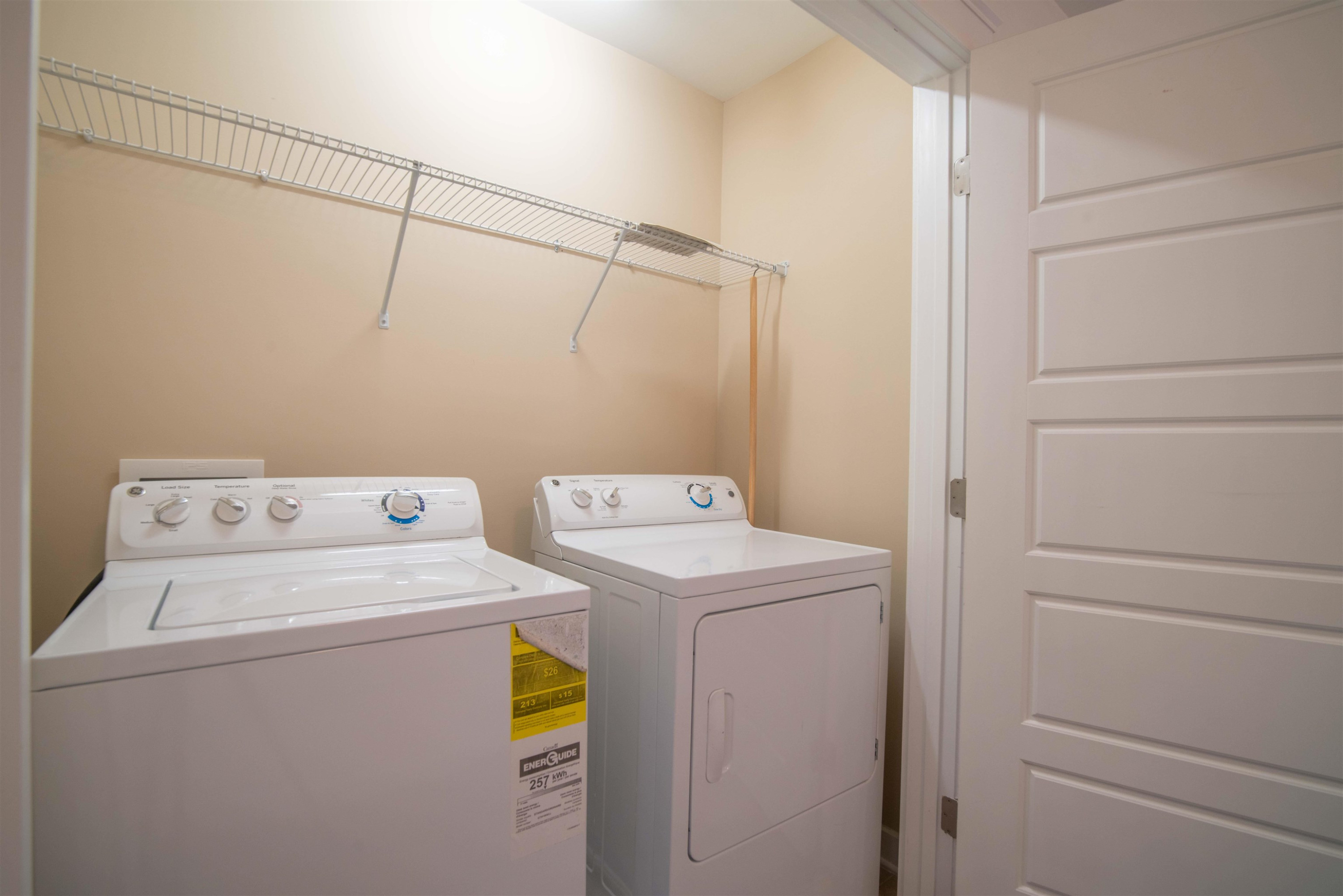 7922 Allscott Way Raleigh, NC 27612 - Photo 23 of 28 a utility room with dryer and washer
