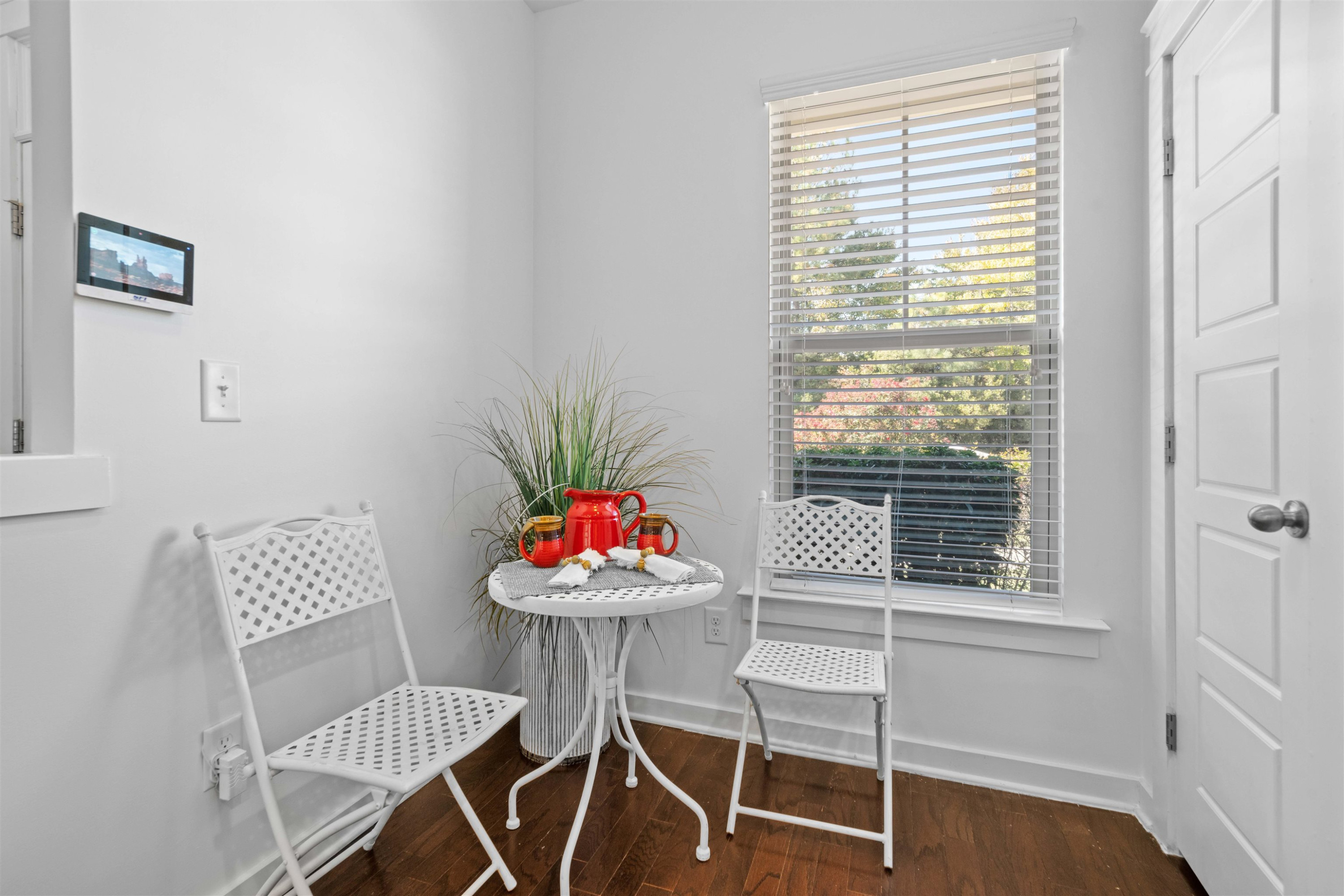 7922 Allscott Way Raleigh, NC 27612 - Photo 4 of 28 a dining room with furniture and wooden floor