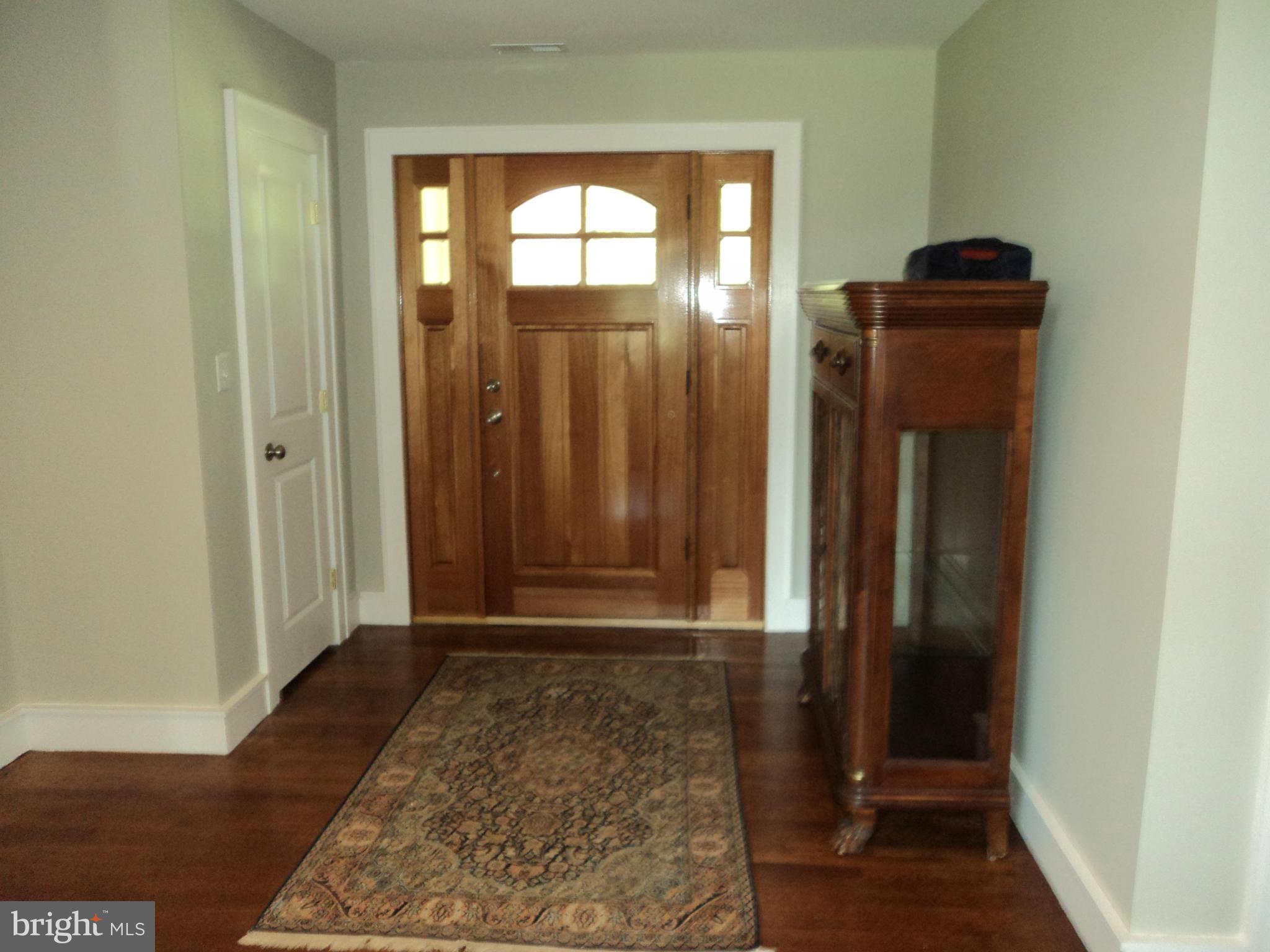 6871 Edge Creek Road St. Michaels, MD 21663 - Photo 11 of 26 a view of entryway with wooden floor