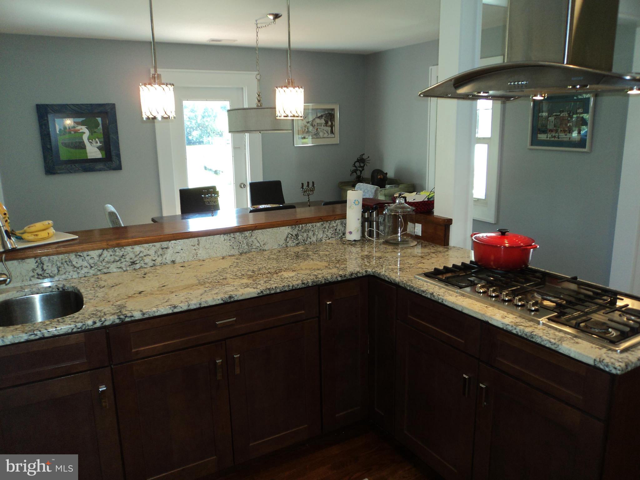 6871 Edge Creek Road St. Michaels, MD 21663 - Photo 13 of 26 a kitchen with a sink and cabinets