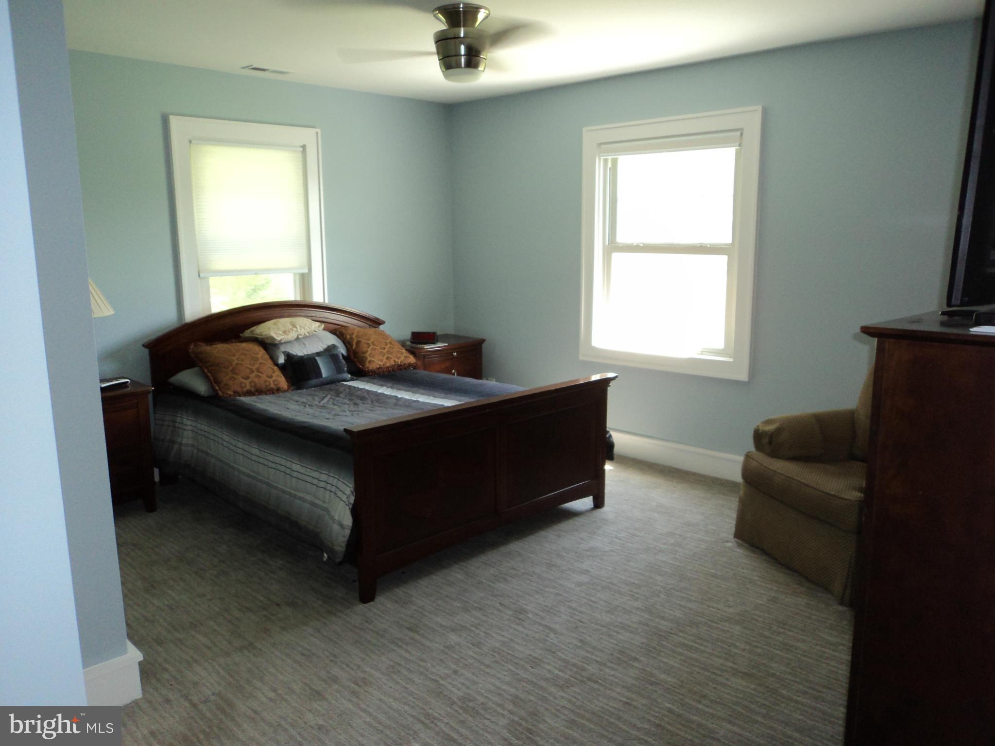 6871 Edge Creek Road St. Michaels, MD 21663 - Photo 17 of 26 a living room with furniture and a window