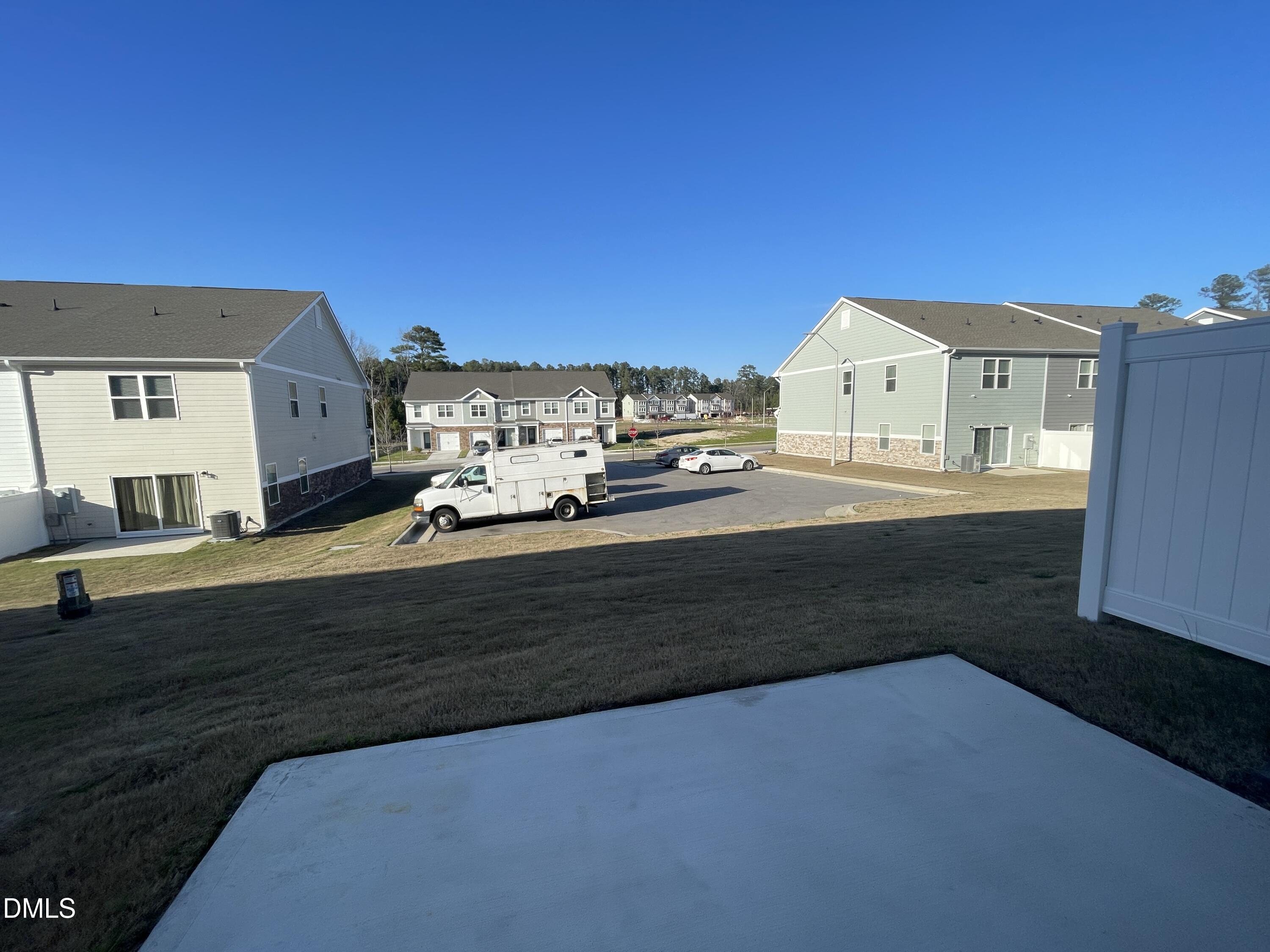 6911 Outfall Point Lane Raleigh, NC 27616 - Photo 21 of 34 a view of a house with a cars park