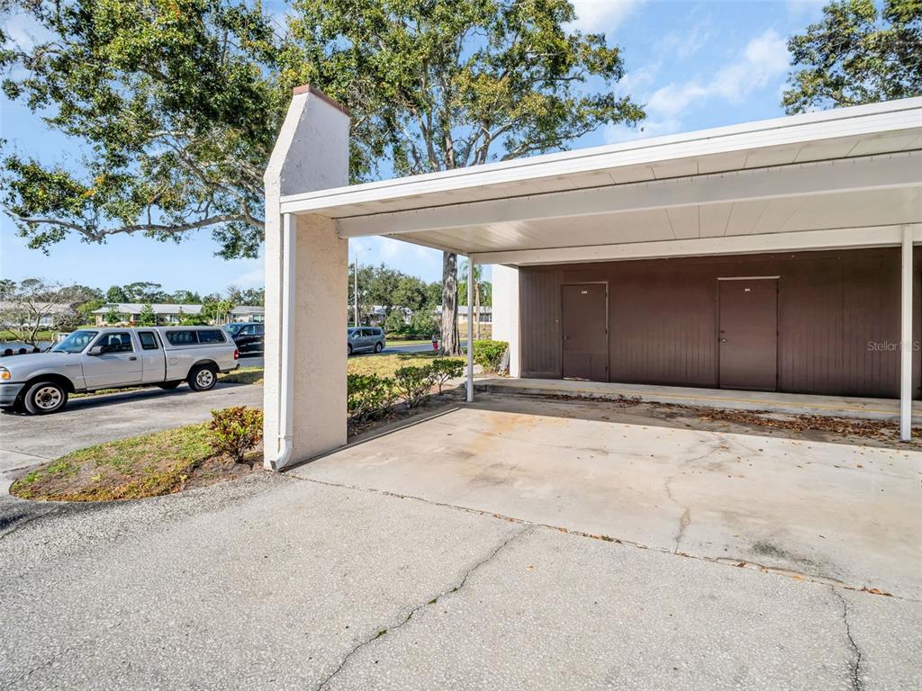 3109 Mission Grove Drive, Unit D Palm Harbor, FL 34684 - Photo 2 of 62 a view of a car parked in front of a house