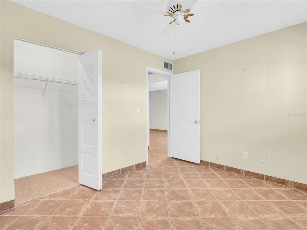 3109 Mission Grove Drive, Unit D Palm Harbor, FL 34684 - Photo 23 of 62 a view of an empty room