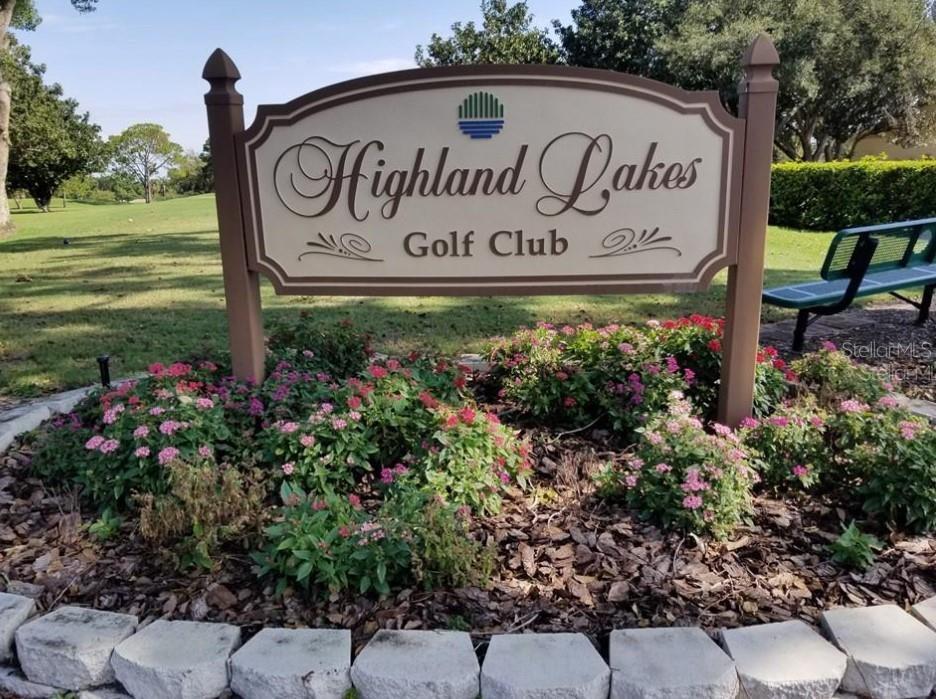 3109 Mission Grove Drive, Unit D Palm Harbor, FL 34684 - Photo 45 of 62 a sign on the side of the road