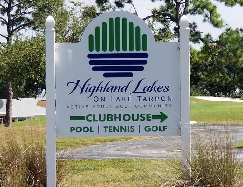 3109 Mission Grove Drive, Unit D Palm Harbor, FL 34684 - Photo 46 of 62 a view of a sign in front of a house