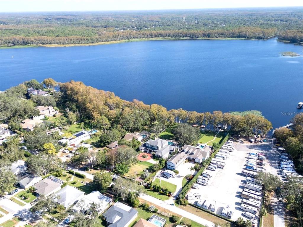 3109 Mission Grove Drive, Unit D Palm Harbor, FL 34684 - Photo 52 of 62 a view of a lake with a mountain