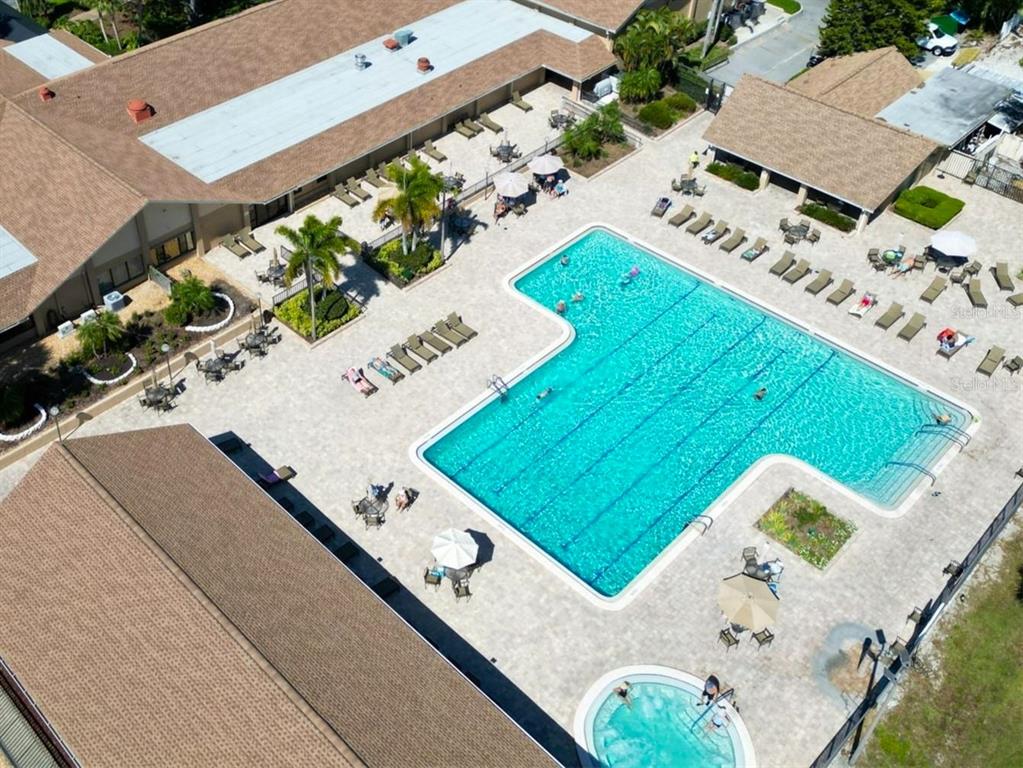 3109 Mission Grove Drive, Unit D Palm Harbor, FL 34684 - Photo 60 of 62 an aerial view of a house with a yard