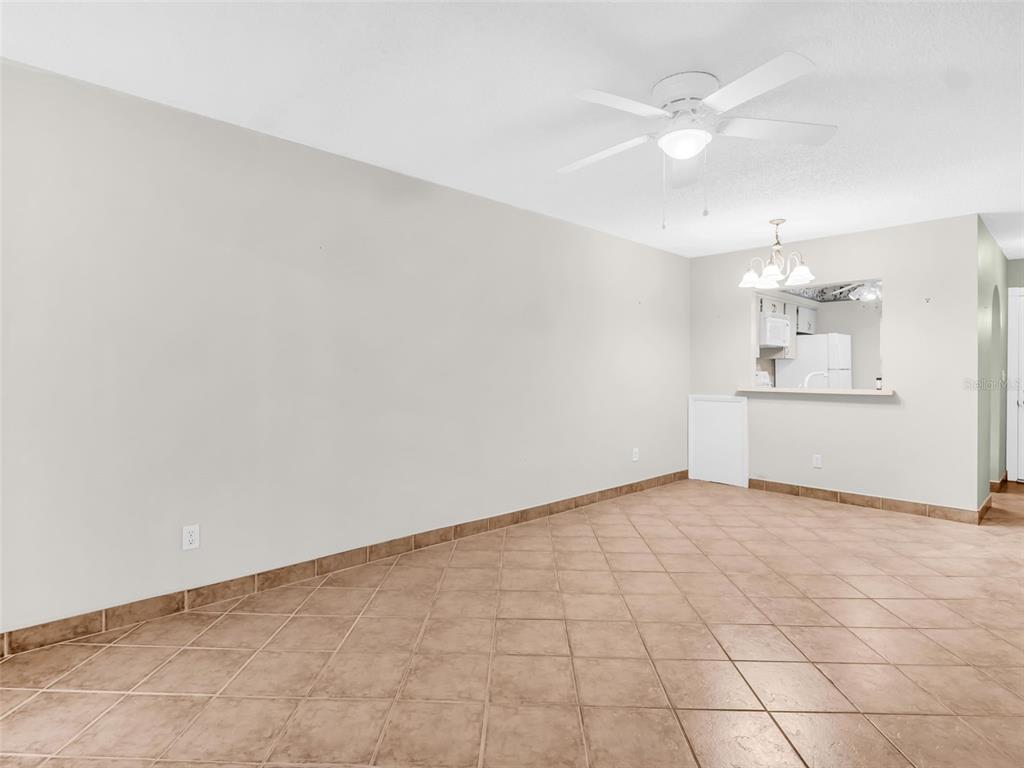 3109 Mission Grove Drive, Unit D Palm Harbor, FL 34684 - Photo 8 of 62 an empty room with a bathroom