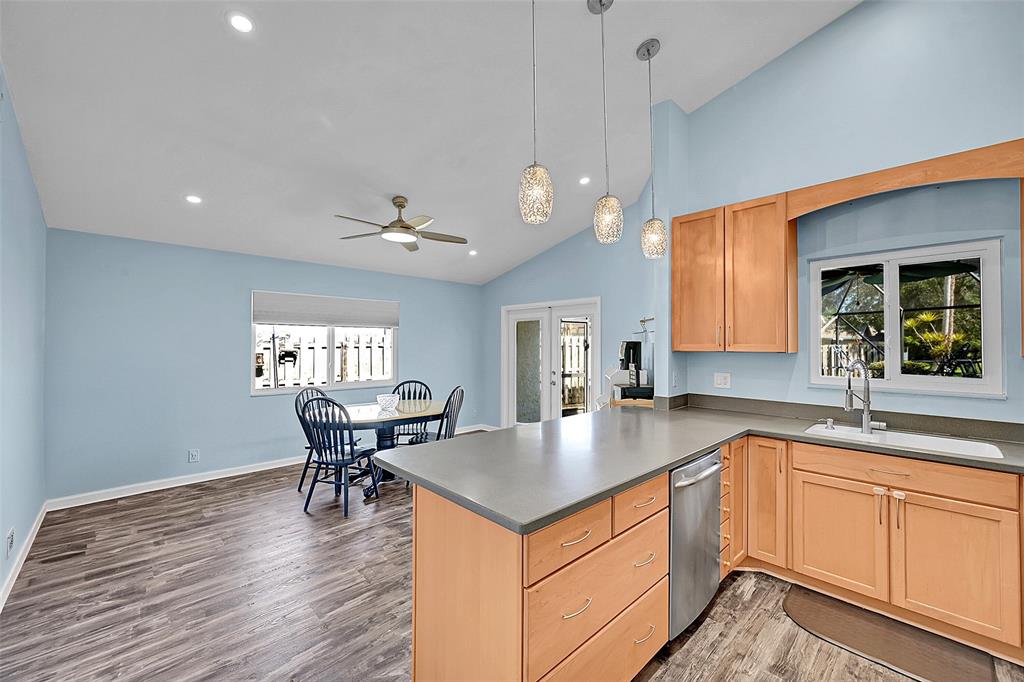22533 Swordfish Drive Boca Raton, FL 33428 - Photo 16 of 49 a kitchen with a sink cabinets and window